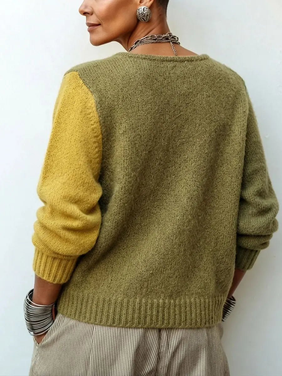 Jersey de punto asimétrico y acogedor con bloques de color artísticos.