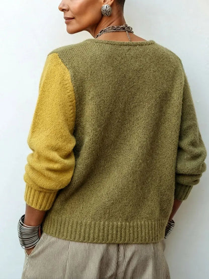 Jersey de punto asimétrico y acogedor con bloques de color artísticos.